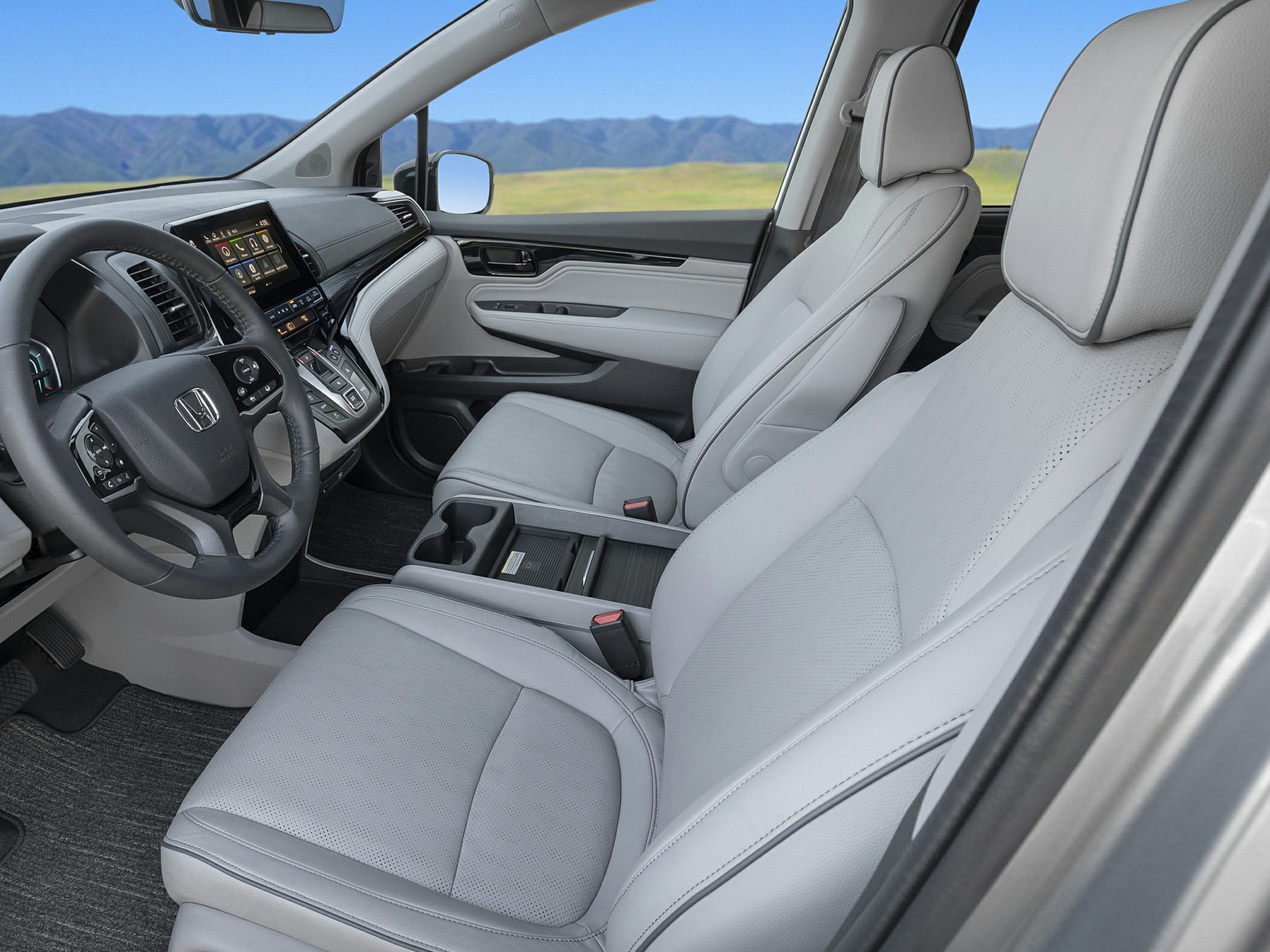 Modern front interior with leather seats and advanced dashboard