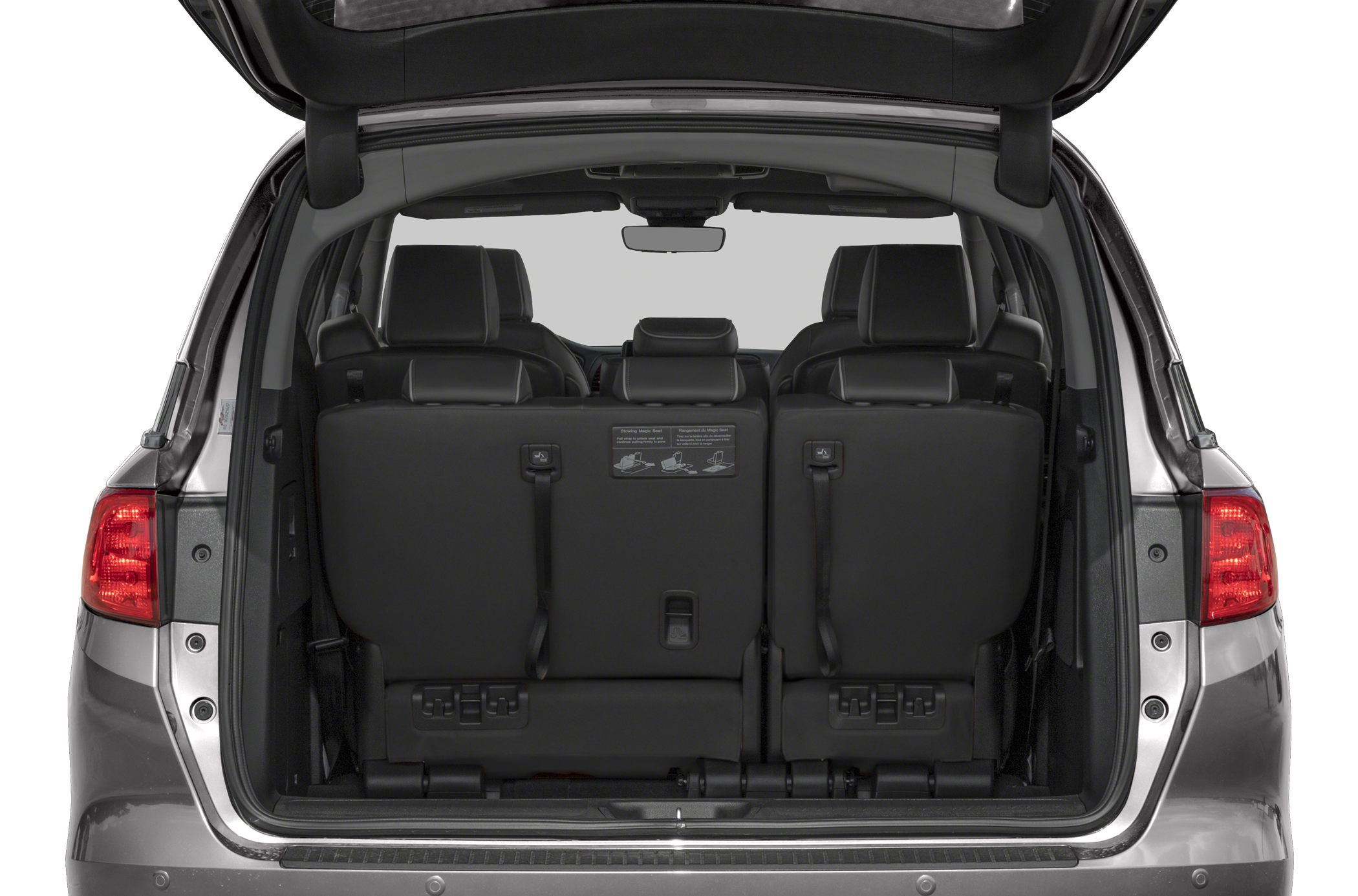 Rear open tailgate showing folded third-row seats and cargo space
