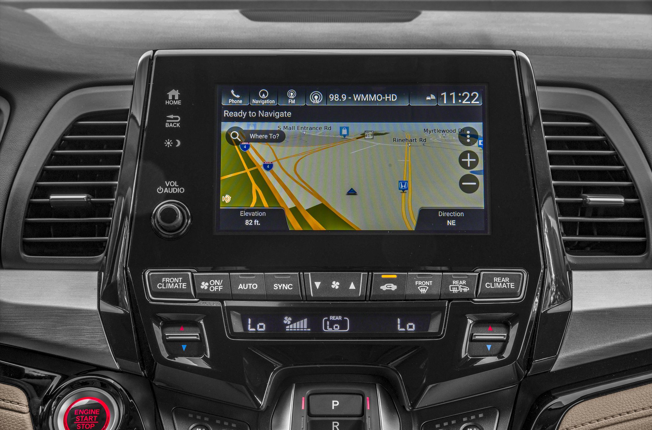 Touchscreen navigation and dual-zone climate control panel with engine start button