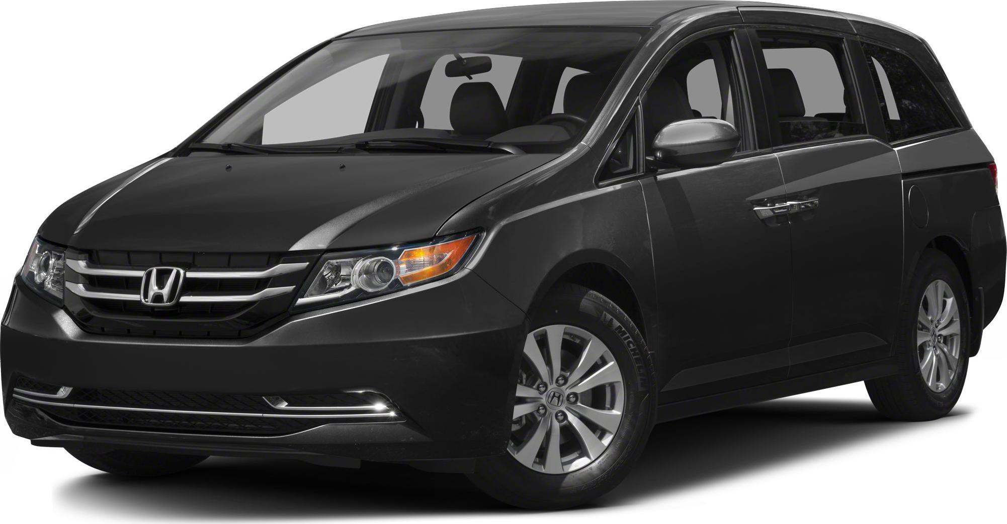 Front and side view of minivan with detailed headlights and alloy wheels