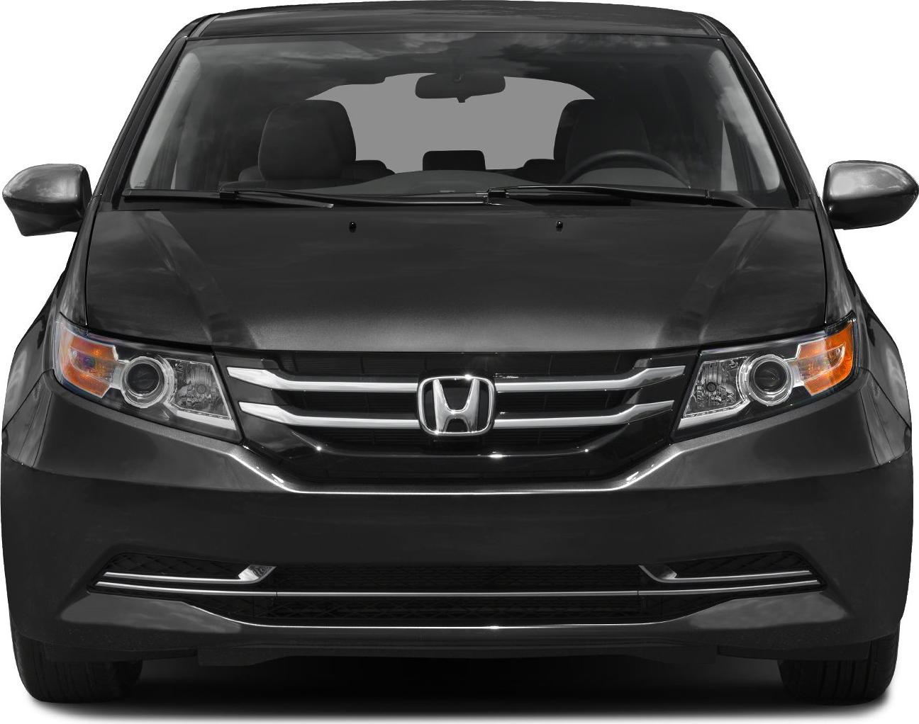 Front view with chrome grille and headlights