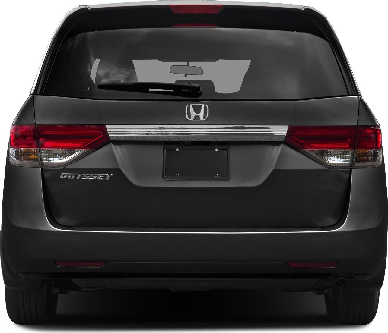 Rear view of a minivan with distinctive tail lights and rear window wiper