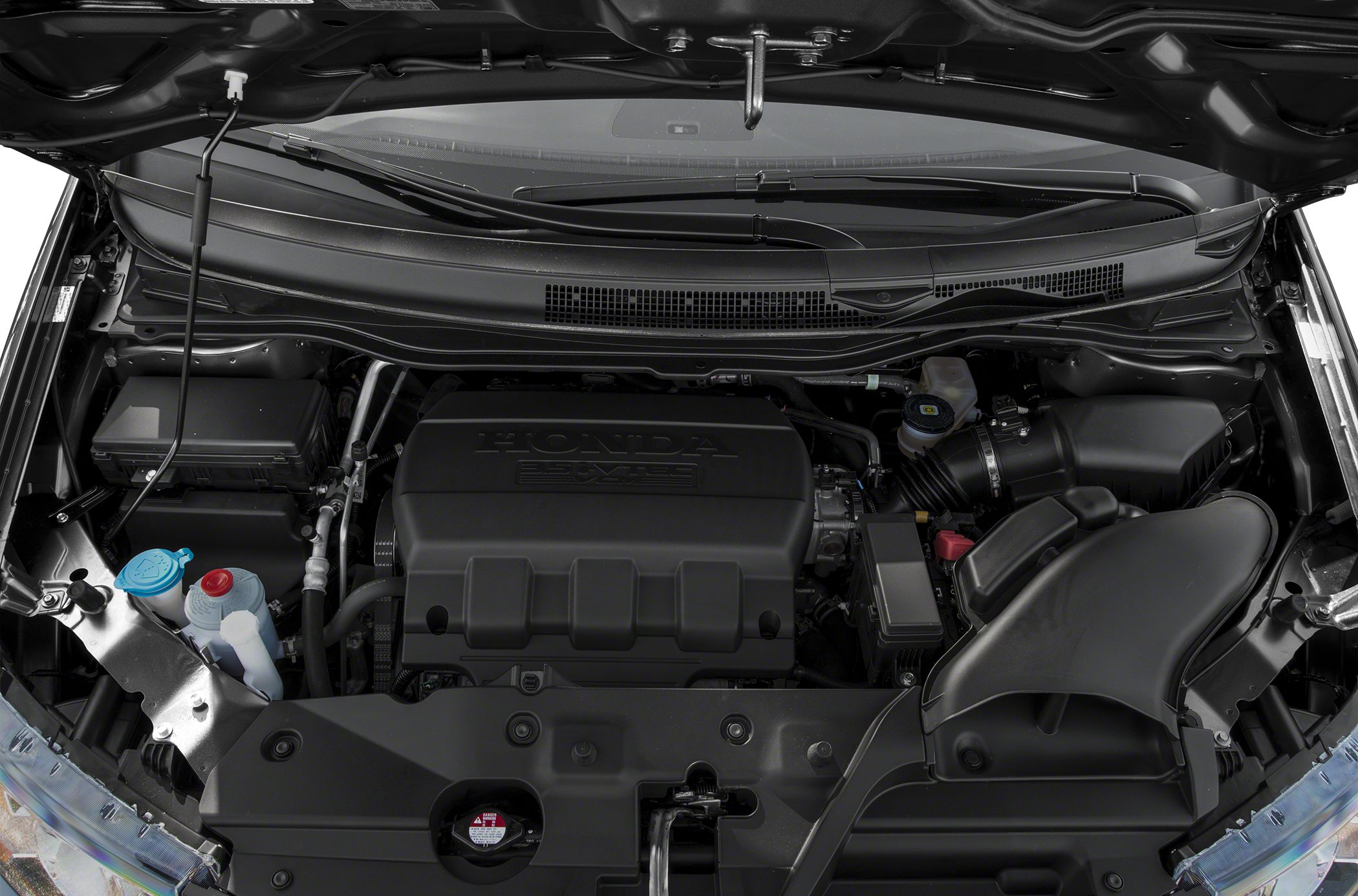 Engine compartment with Honda-branded engine cover and mechanical components