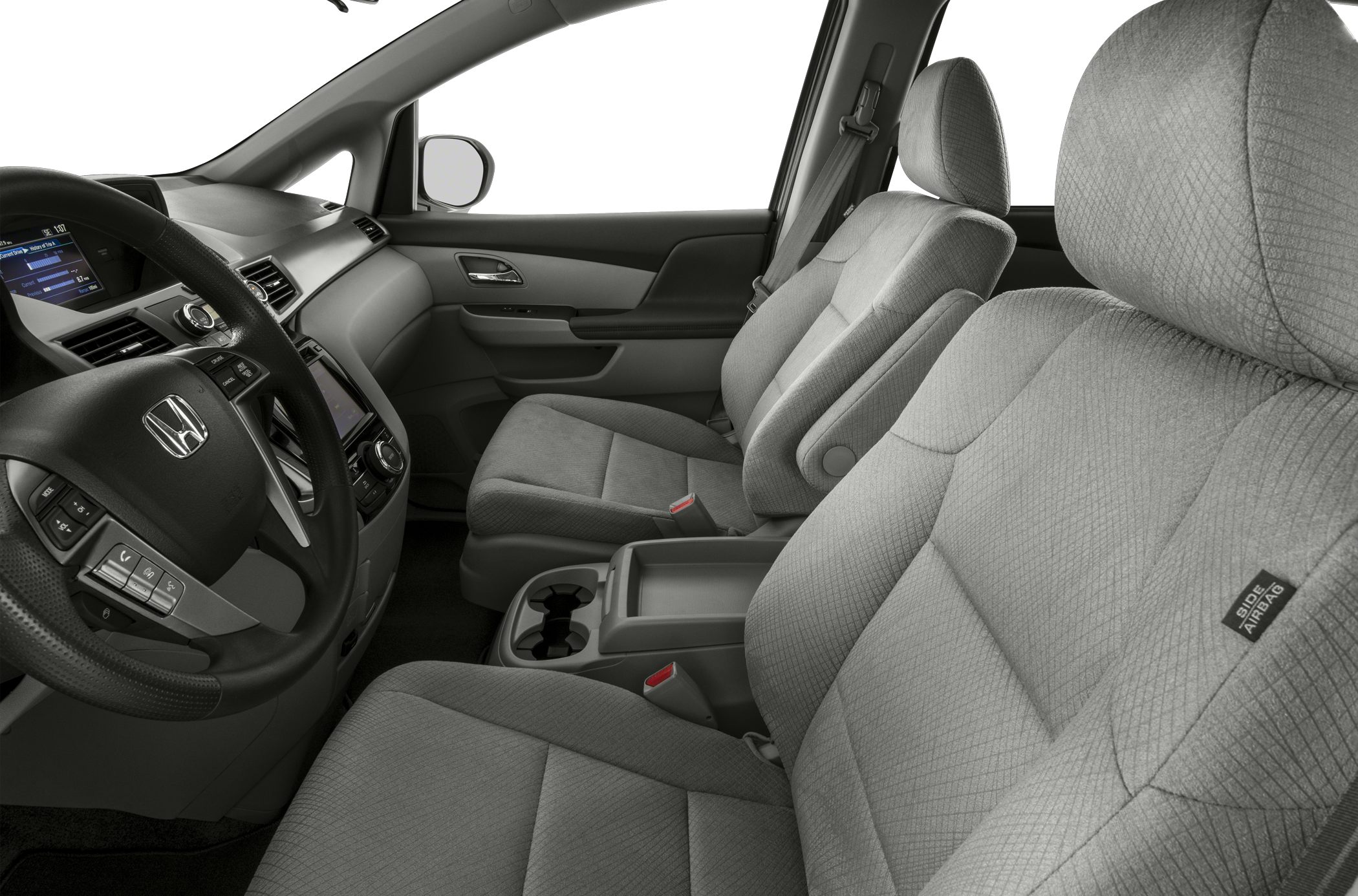 Front passenger and driver seats, dashboard, steering wheel, center console