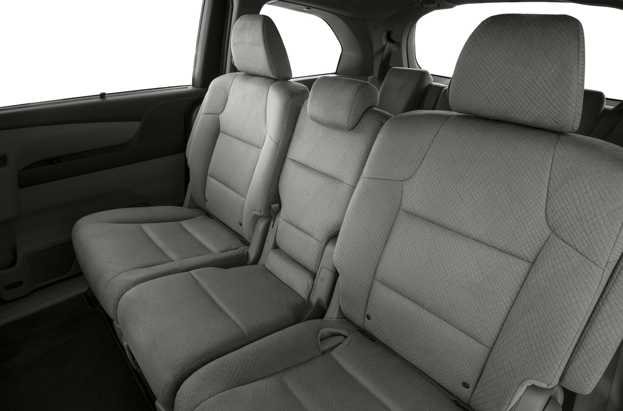 Gray fabric rear passenger seats with headrests and spacious design