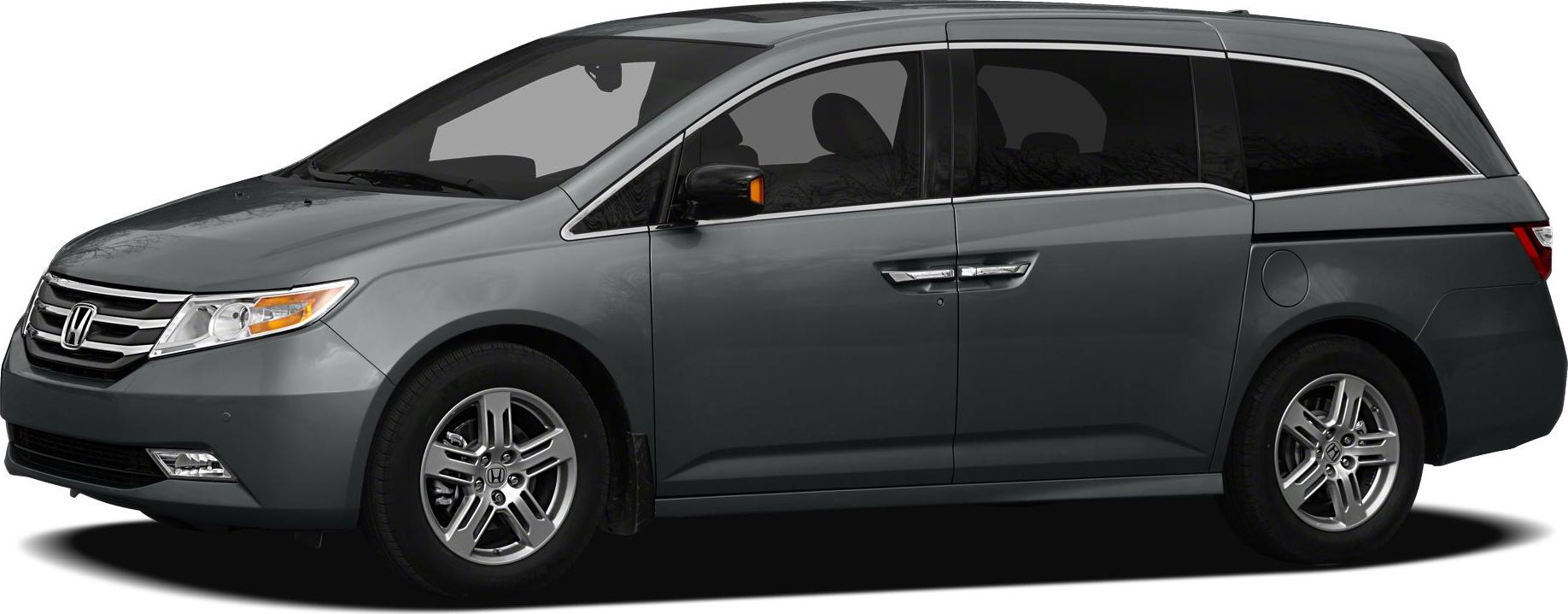 Side profile of a minivan with sliding rear doors and alloy wheels