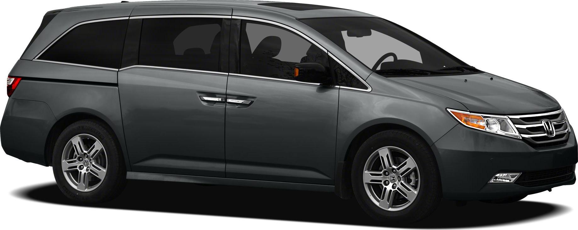 Side view of minivan with sliding door and alloy wheels