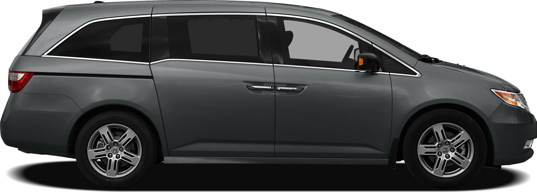 Side profile of a mid-size minivan with sliding doors and alloy wheels