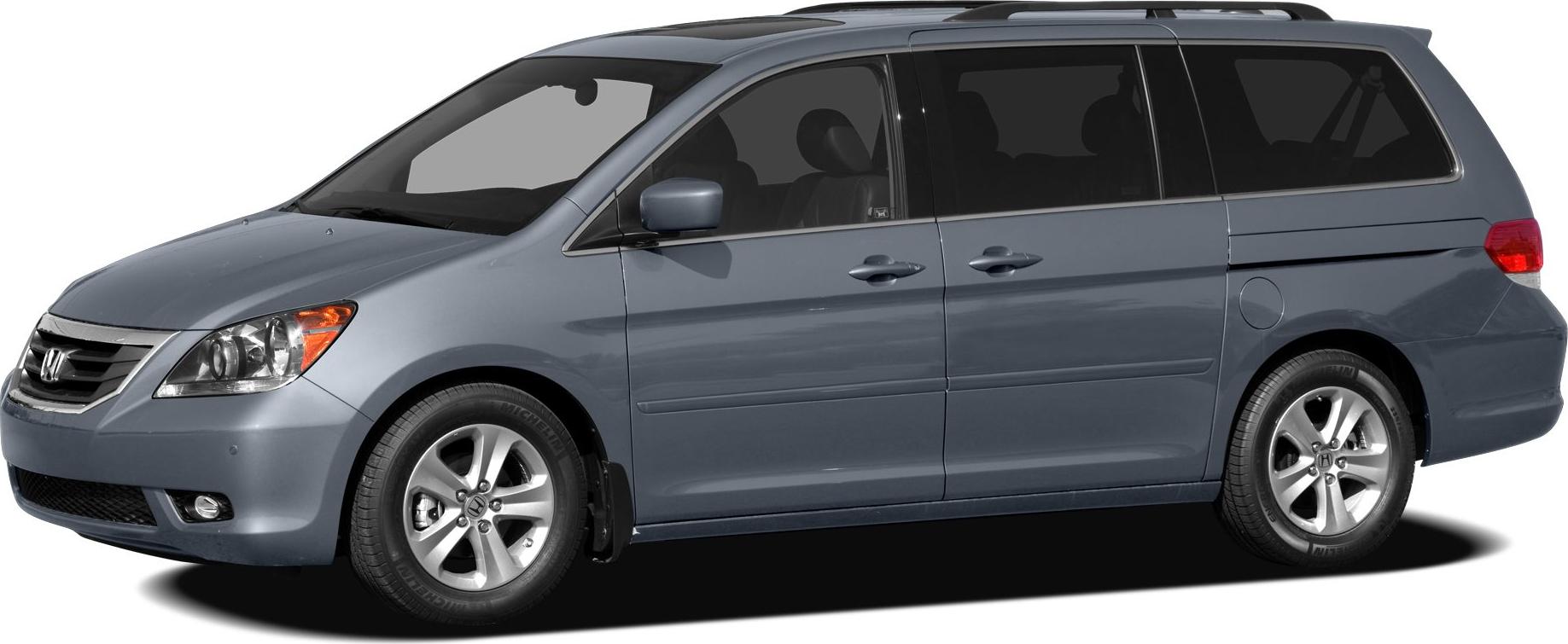 Side profile of a minivan with sliding doors and alloy wheels