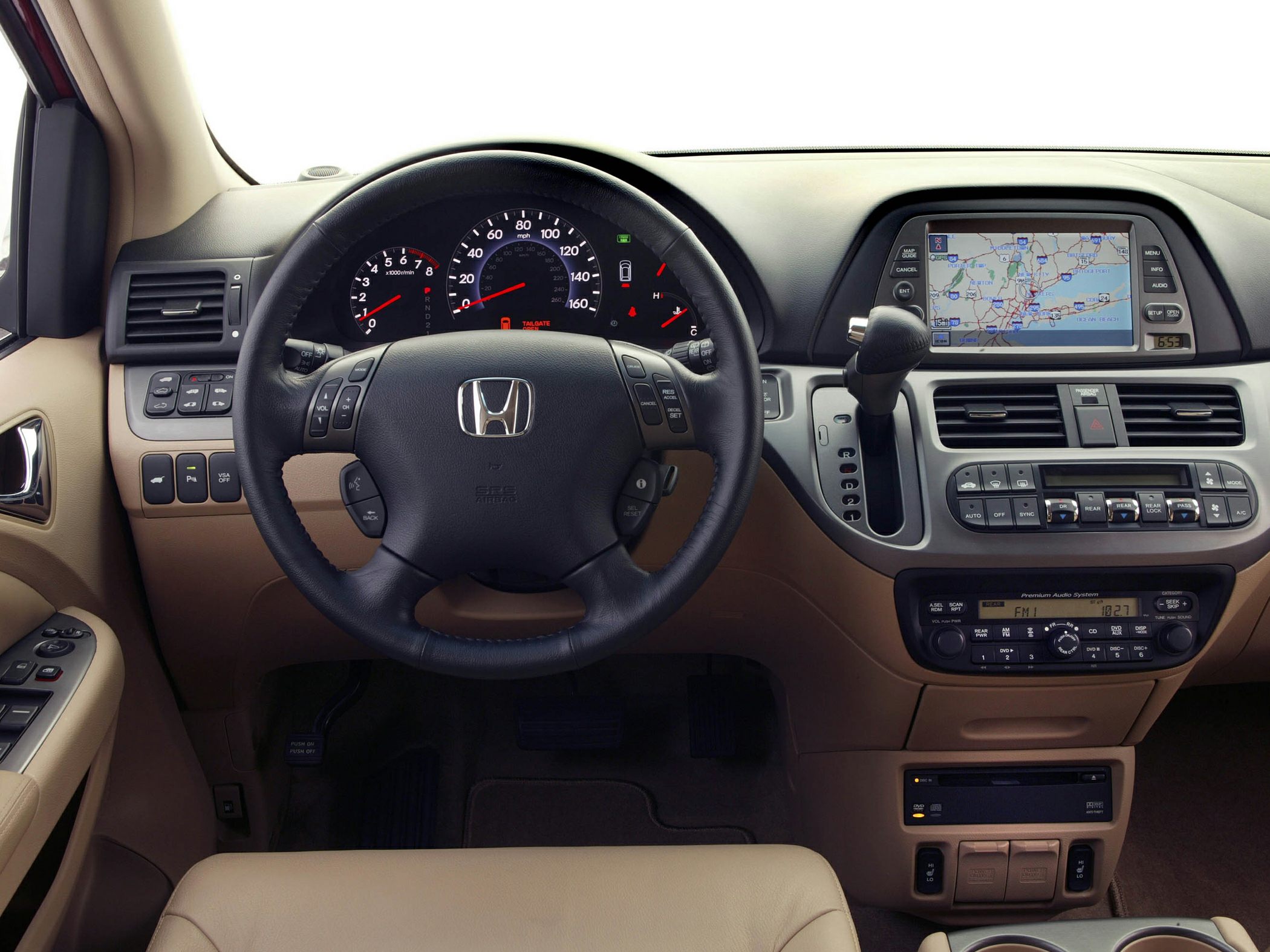 Dashboard with navigation system and multifunction steering wheel