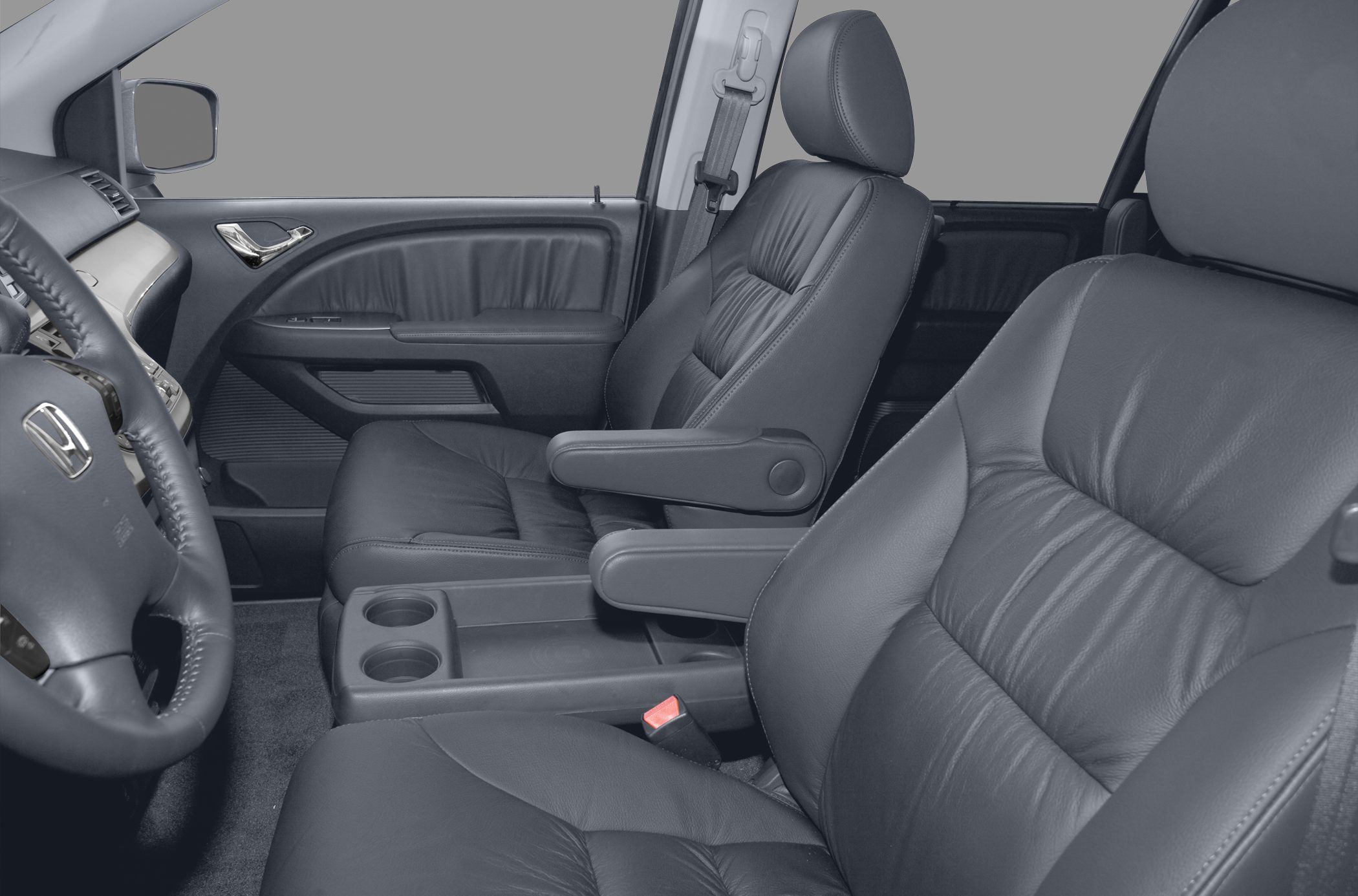 Black leather front seats with armrests and center console cup holders