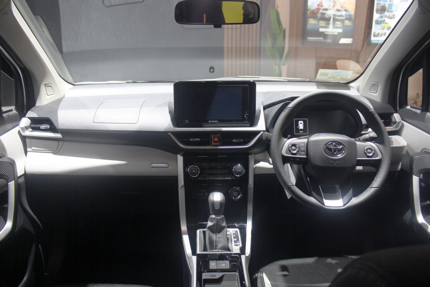 Dashboard with infotainment screen and multifunction steering wheel