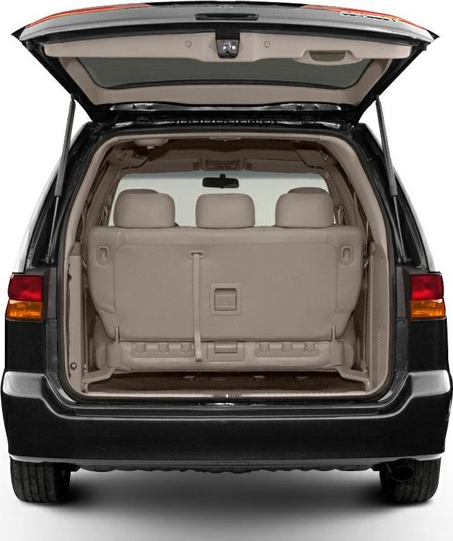 Open rear hatch with beige interior and third-row seats