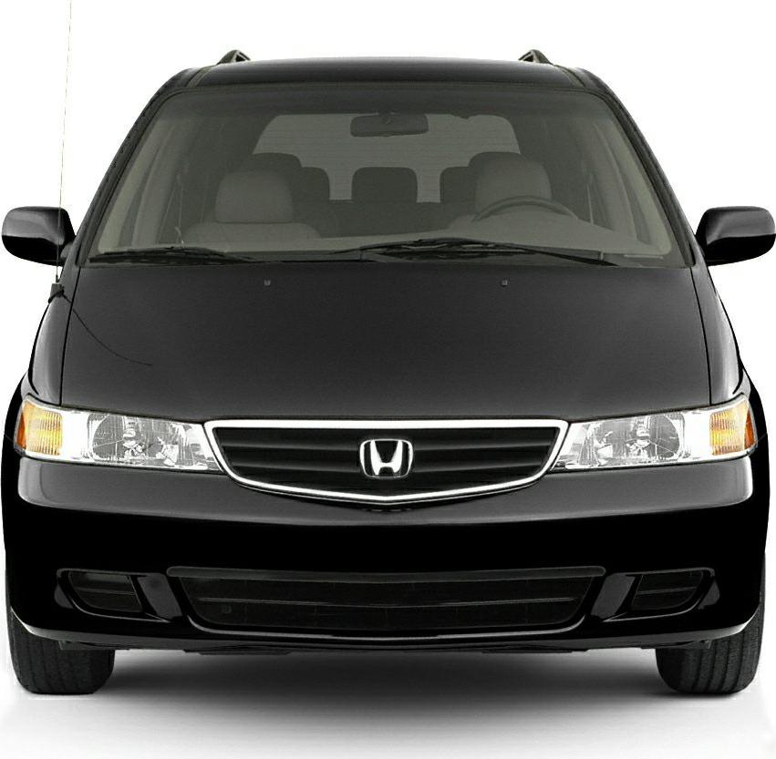 Front view of a minivan with grille, headlights, and smooth design
