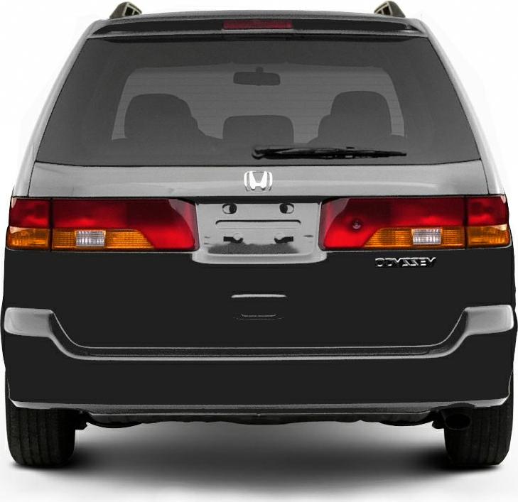 Rear view of minivan featuring tail lights and rear windshield with wiper.