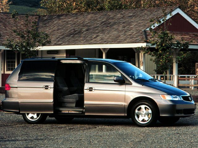 Minivan with sliding side door and spacious seating interior