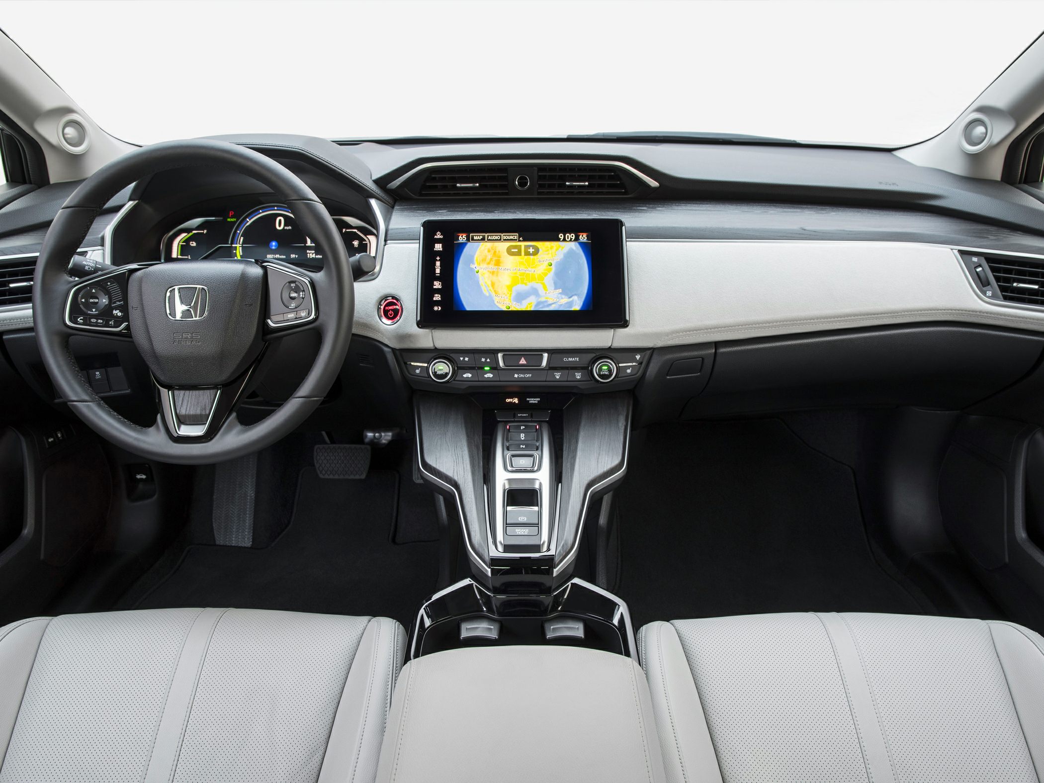 Digital infotainment screen and modern dashboard with steering wheel controls