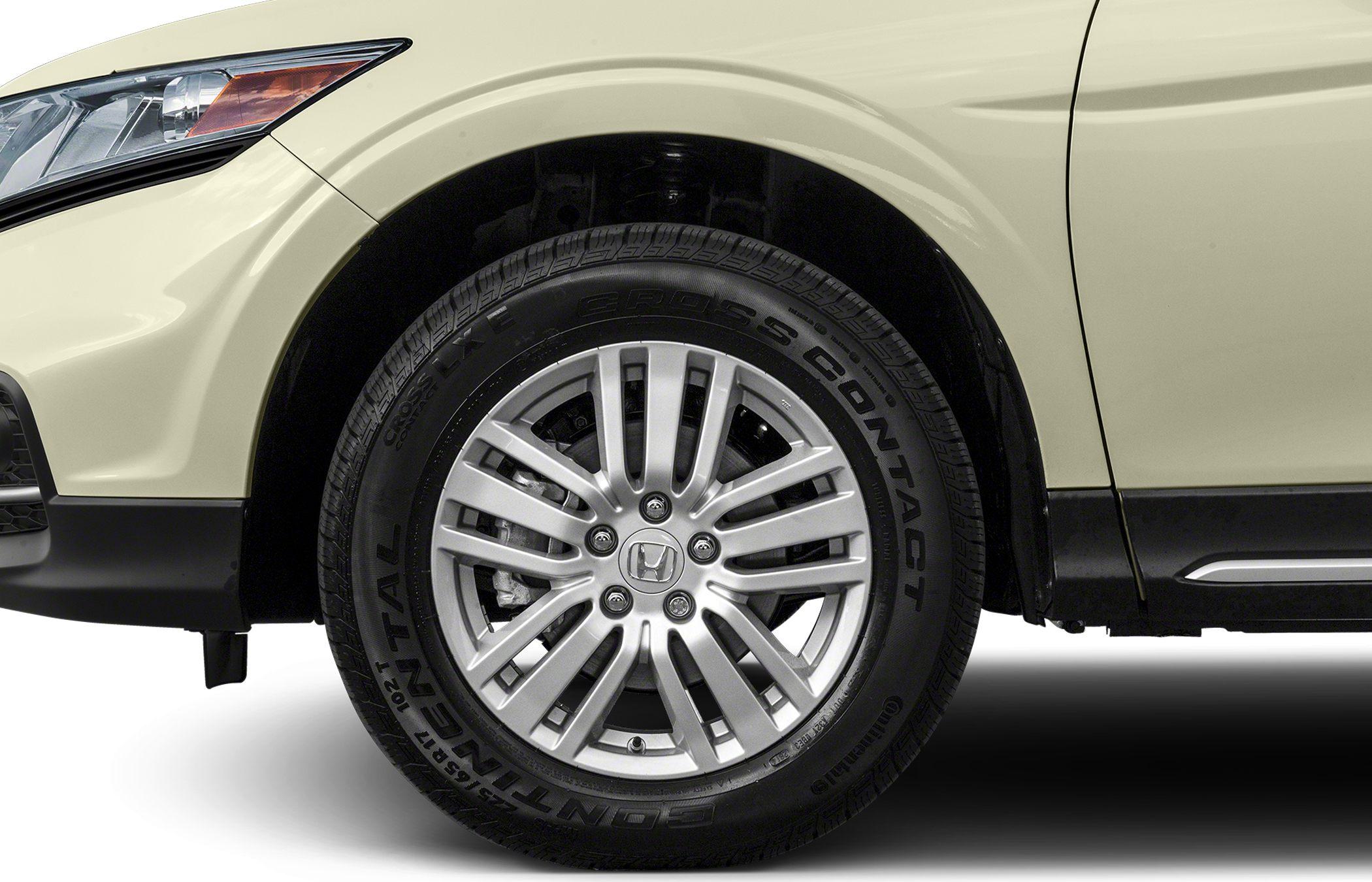 Close-up of alloy wheel and tire with detailed tread