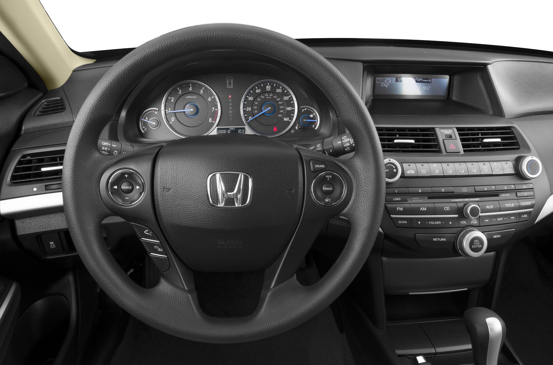 Dashboard and steering wheel with controls and instrument cluster