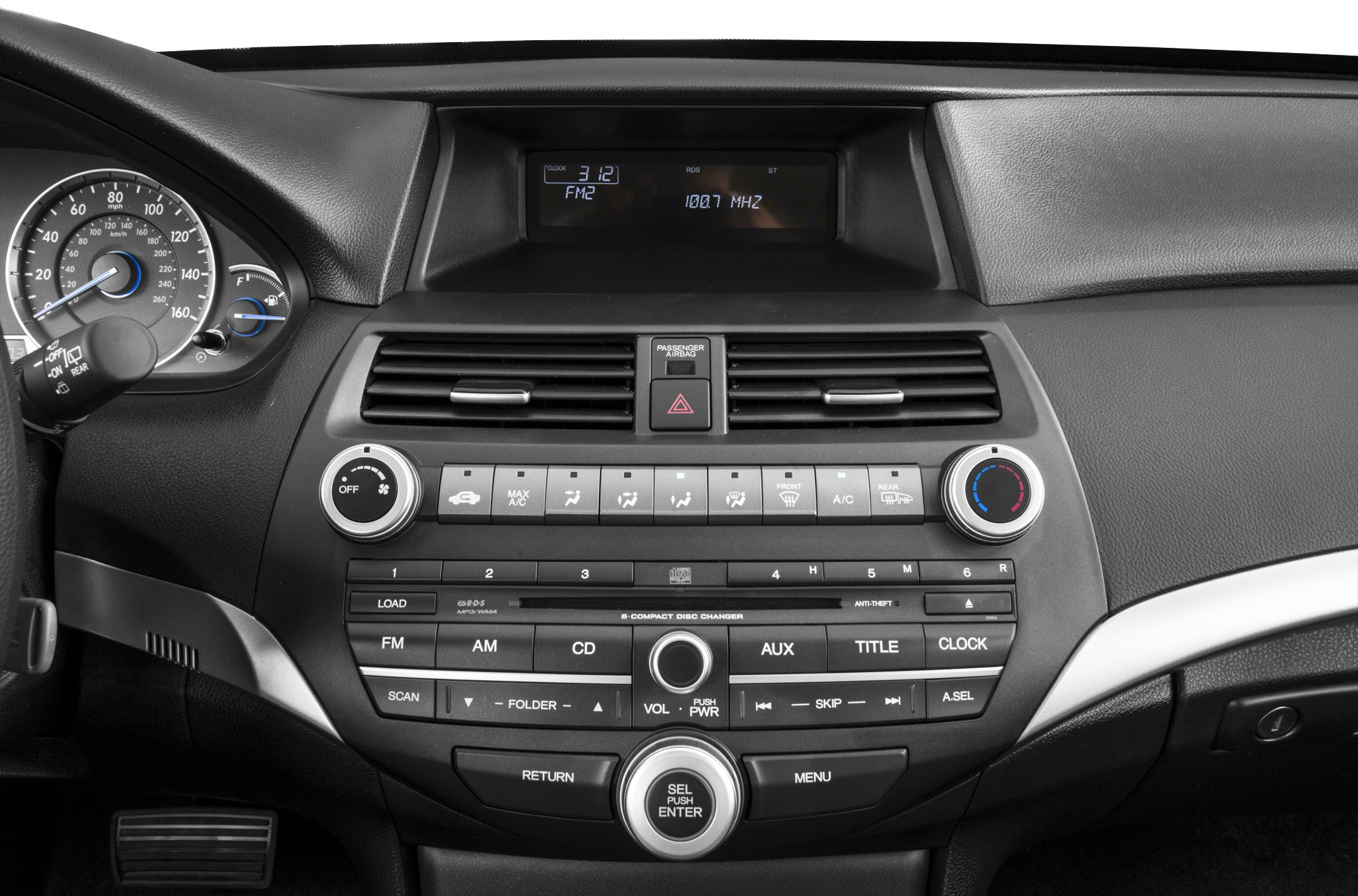 Dashboard with climate and audio controls, digital screen, and air vents.