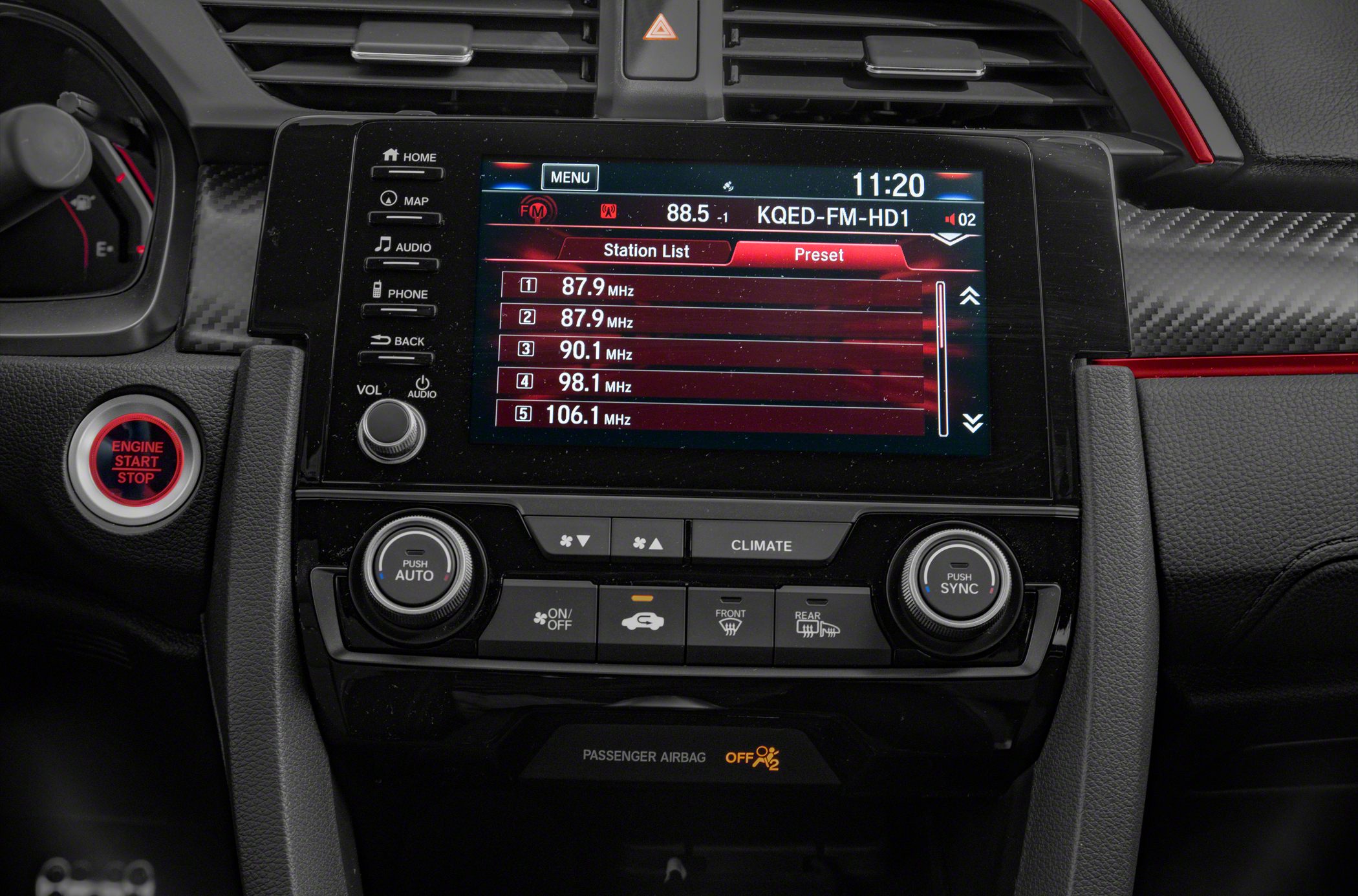 Infotainment screen and climate controls with engine start button