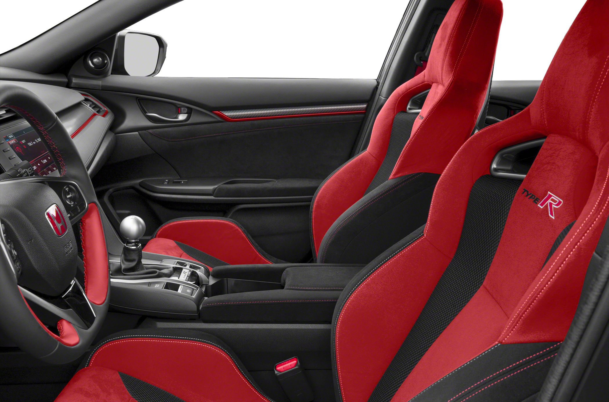 Red racing seats and manual gearbox inside a car interior