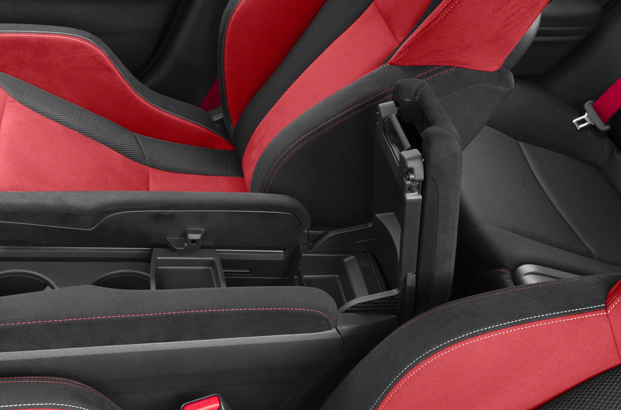 Sport seats and center console storage in red and black upholstery