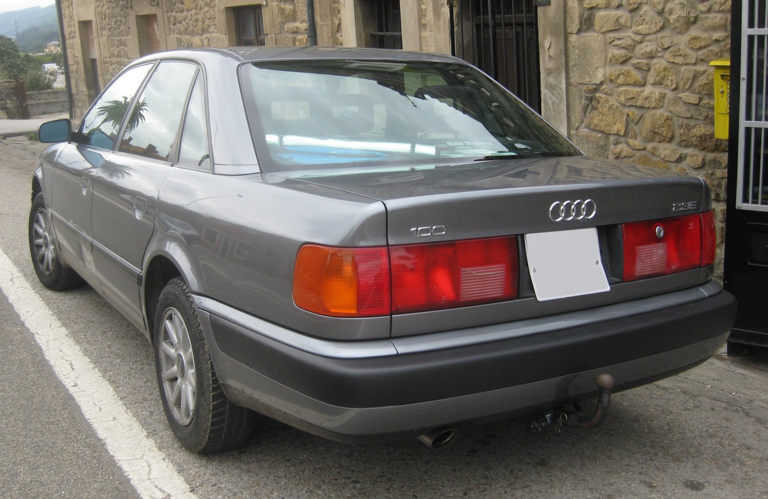 Rear view of a sedan with characteristic taillights and bumper