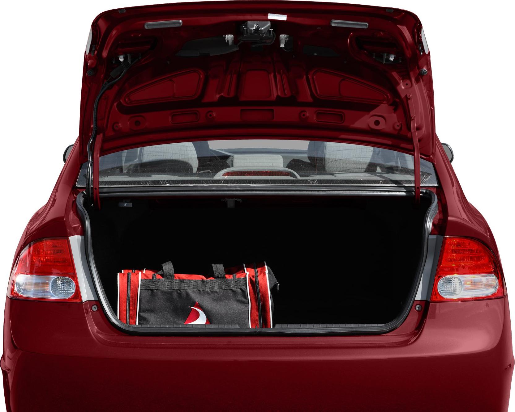 Open rear trunk with taillights and a red-black bag inside