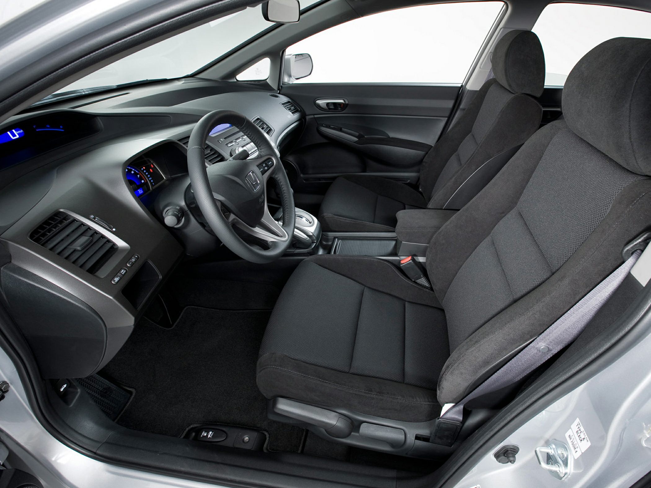 Car interior with dashboard and front seats