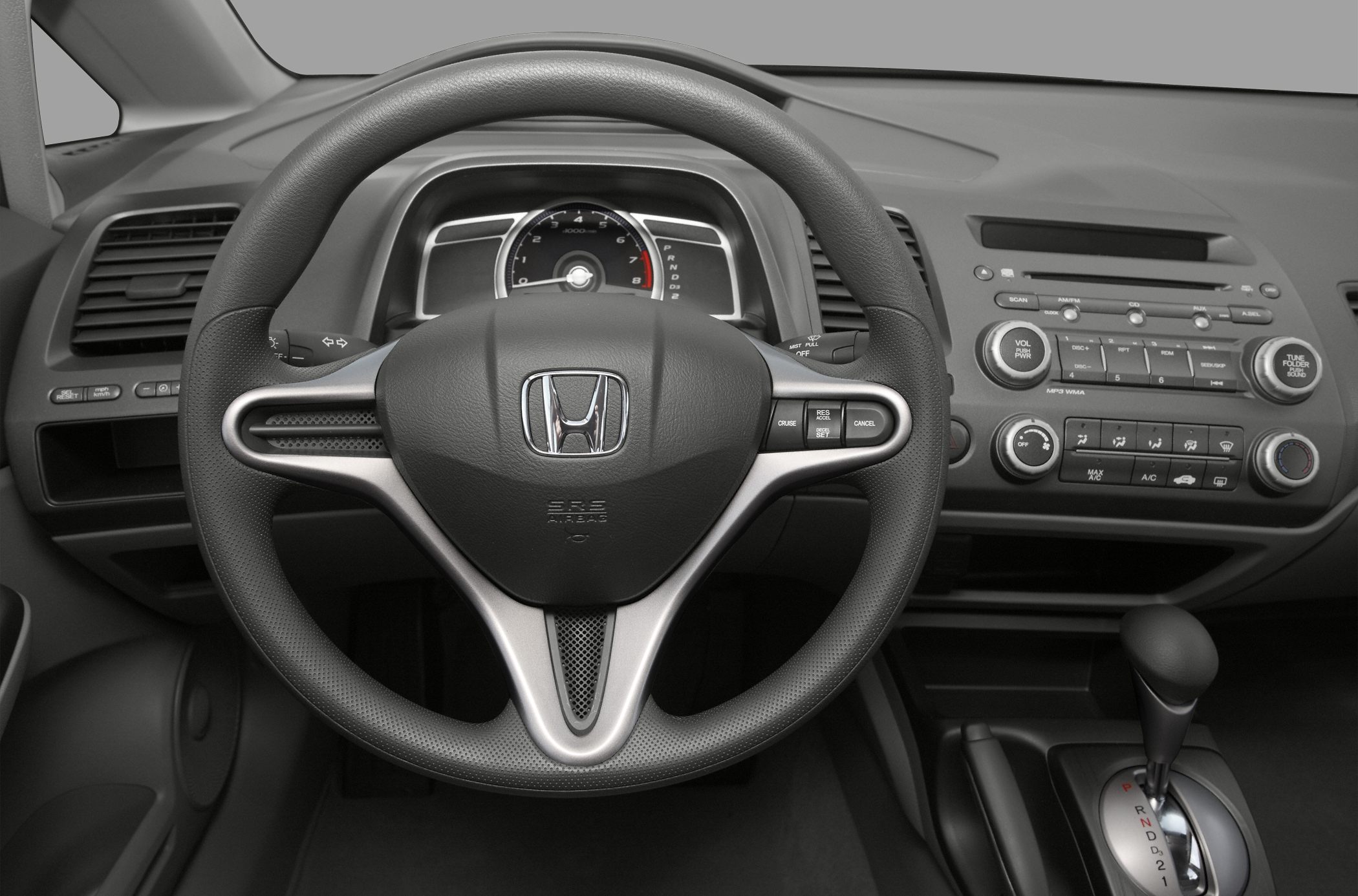 Steering wheel, instrument cluster, and dashboard controls
