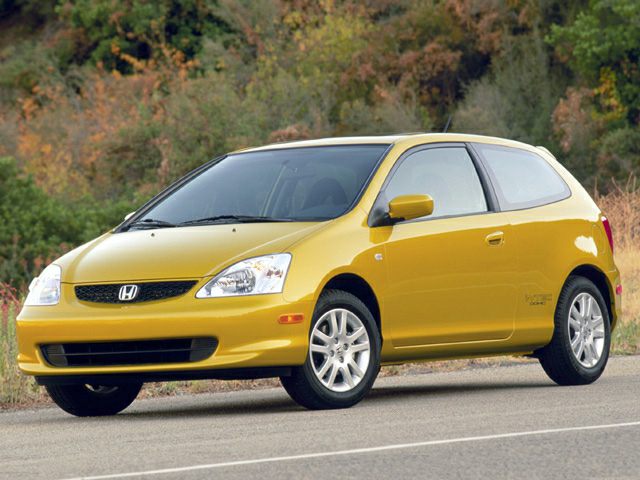 Yellow 3-door hatchback front-side view with sporty wheels