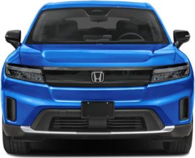 Front view of blue vehicle with LED headlights and modern grill