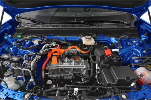 Electric powertrain with wiring and battery layout in engine bay