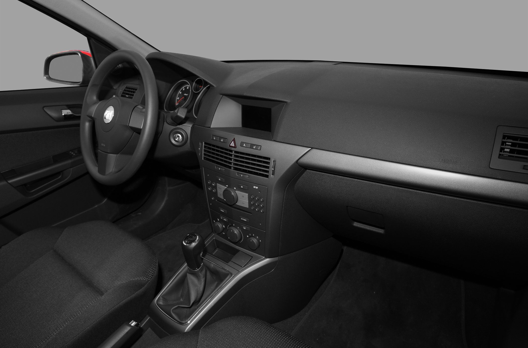 Interior dashboard and manual gear shift console with fabric seats