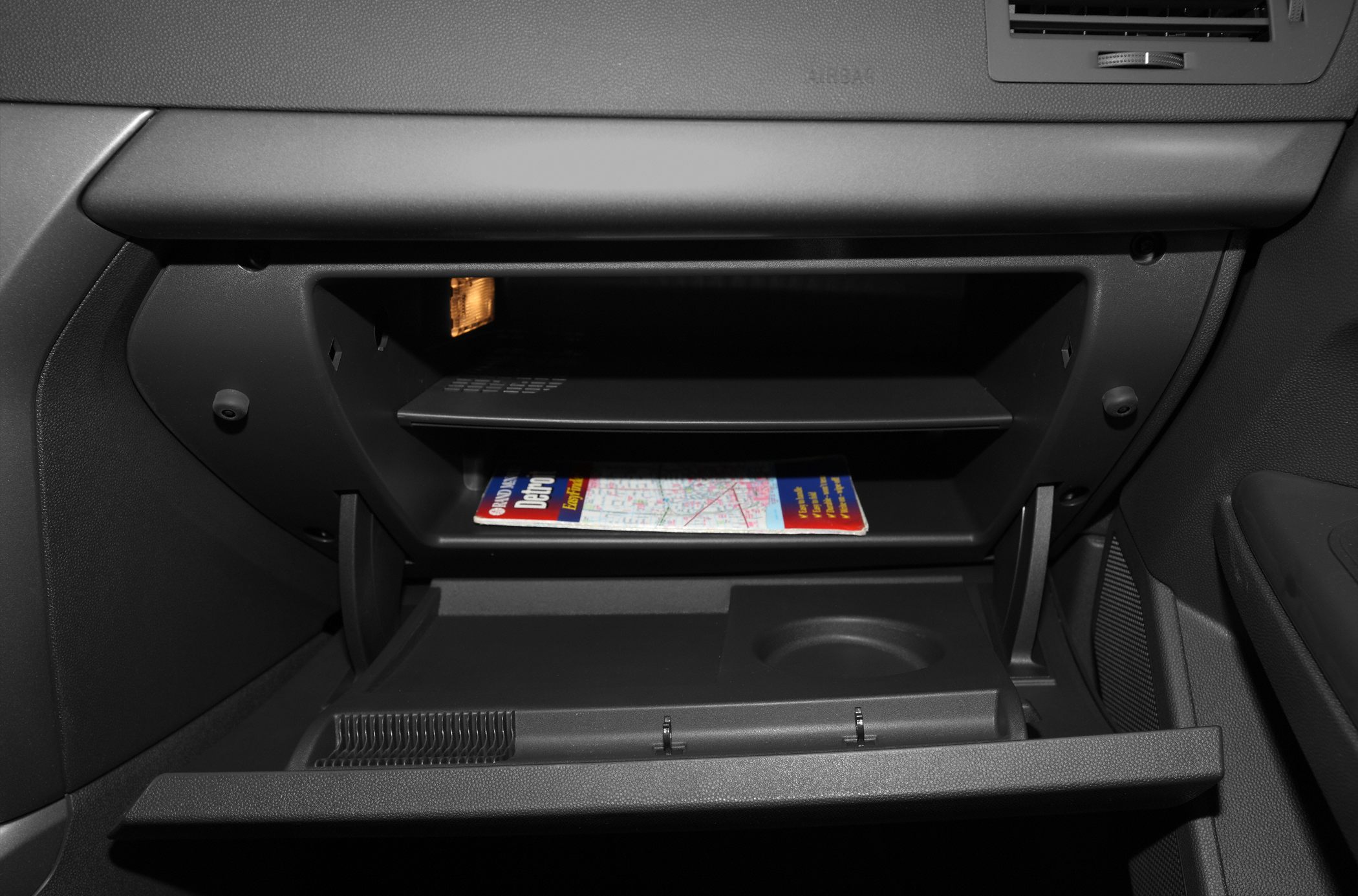 Car interior glove compartment with internal shelves and lighting