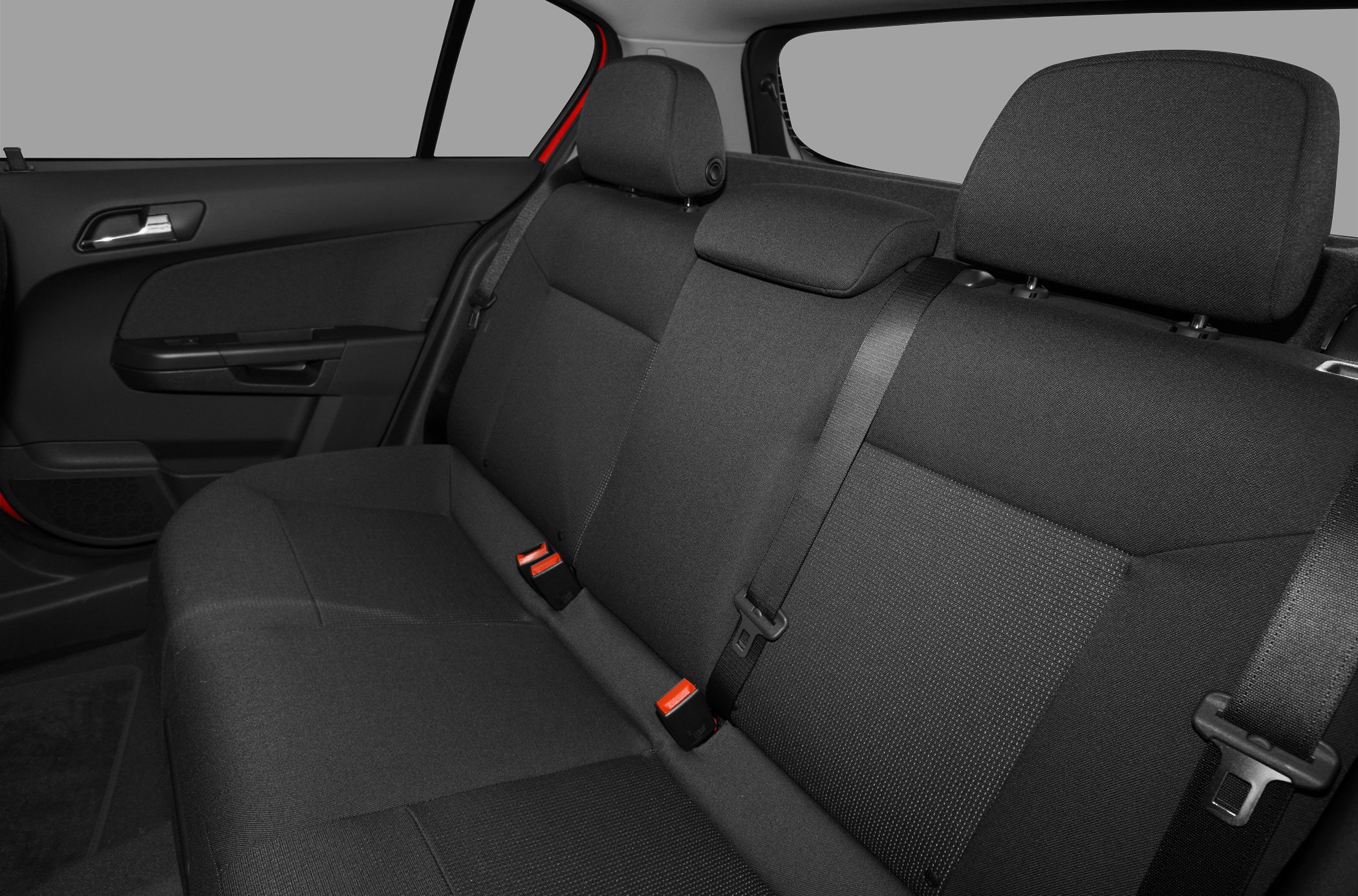 Rear seating with fabric upholstery, three headrests, and seatbelts