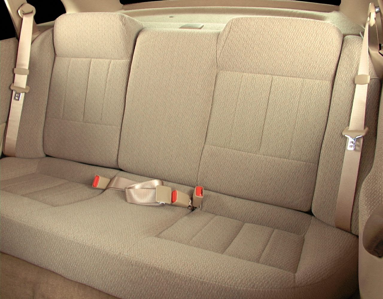 Beige fabric rear bench seat with seatbelts