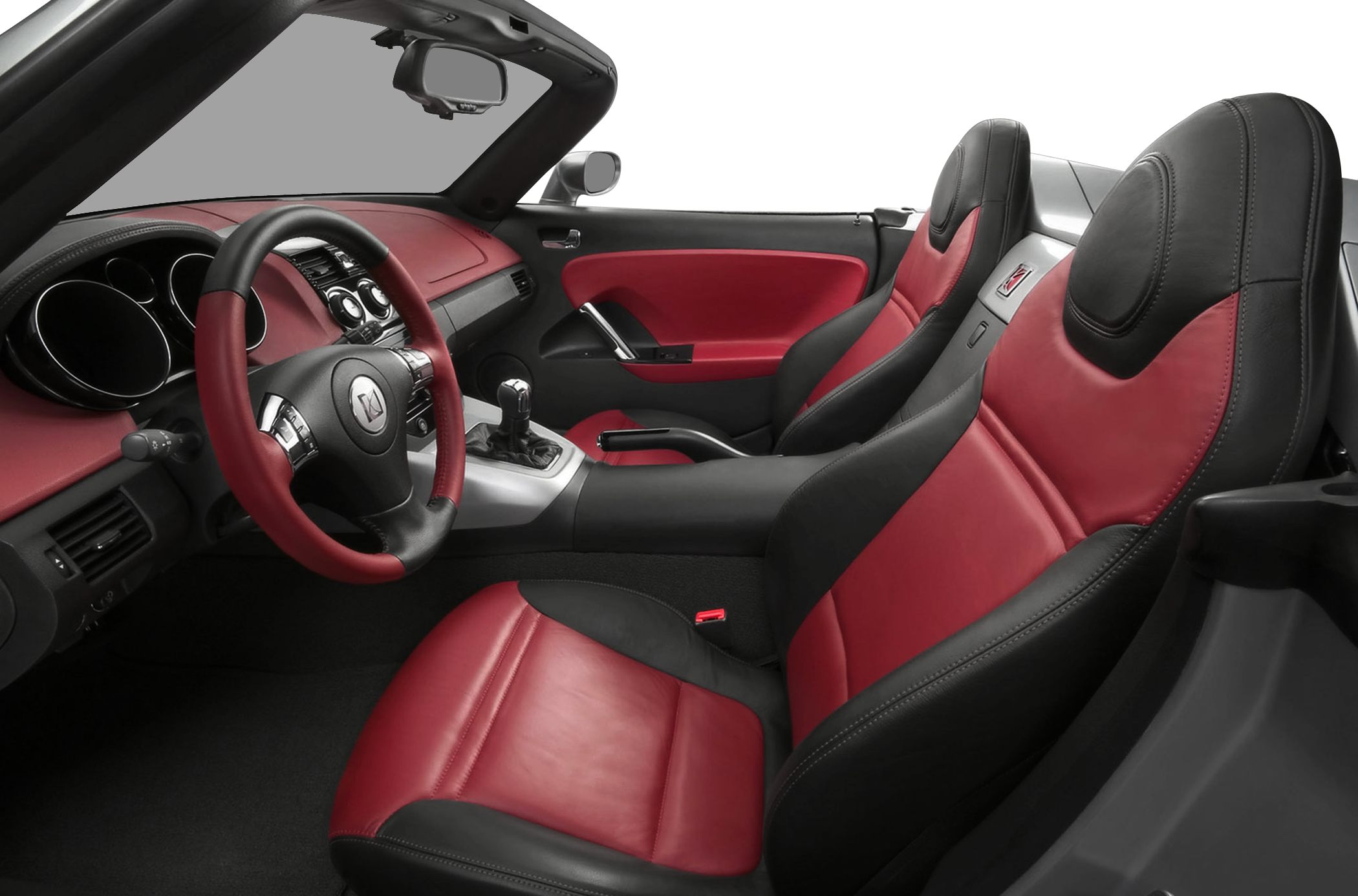 Red and black leather sports seats with manual gear shift
