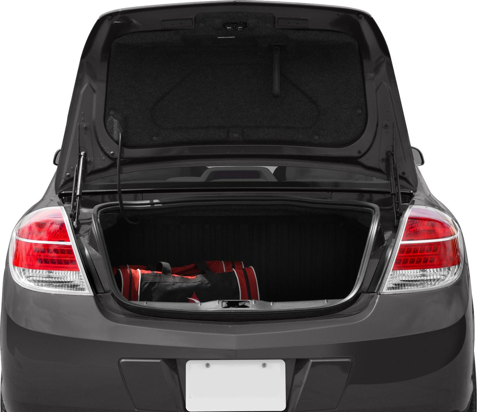 Open trunk of a car with a red-black duffel bag inside.