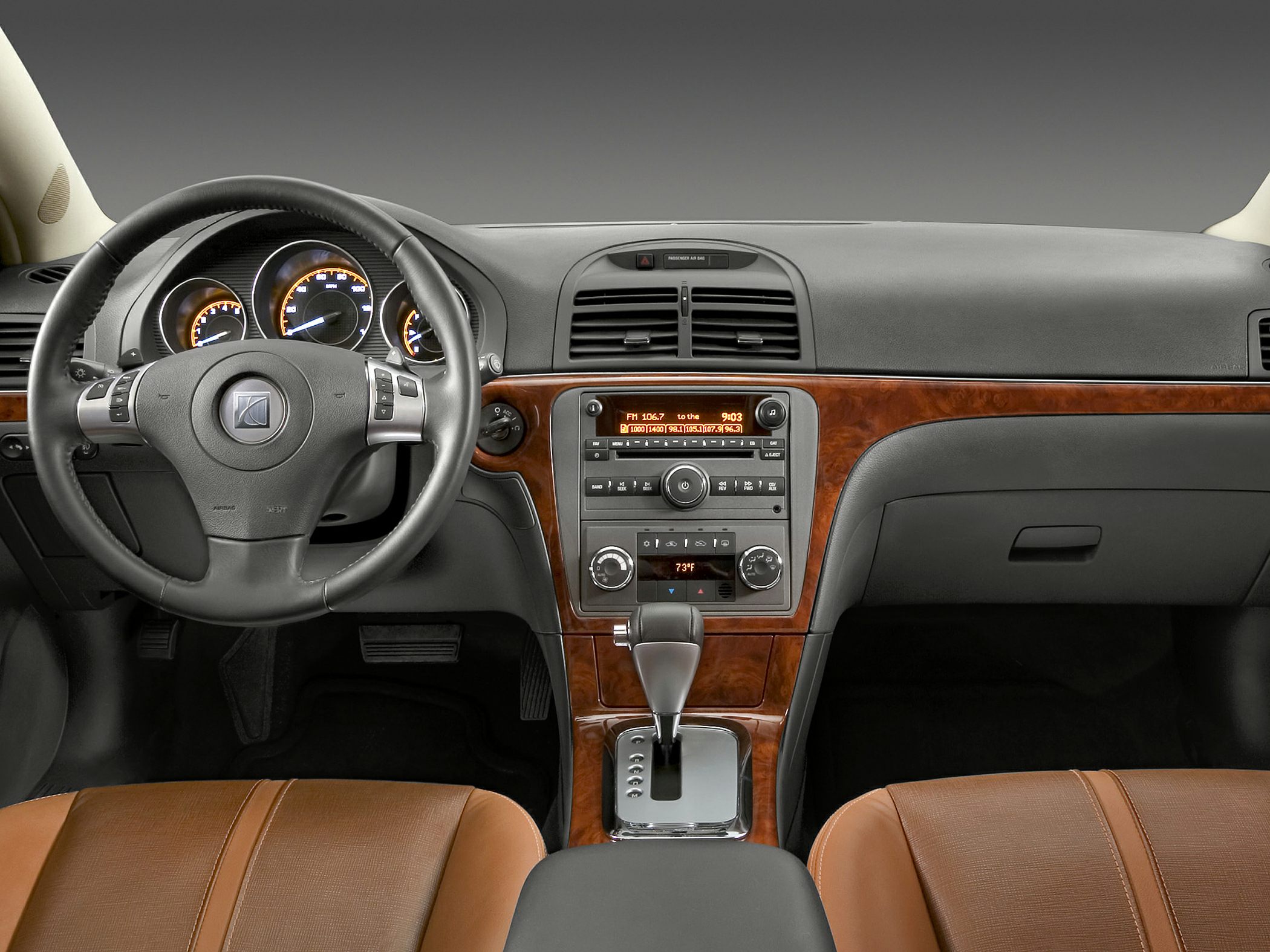 Dashboard, wood-trim center console, steering wheel with controls