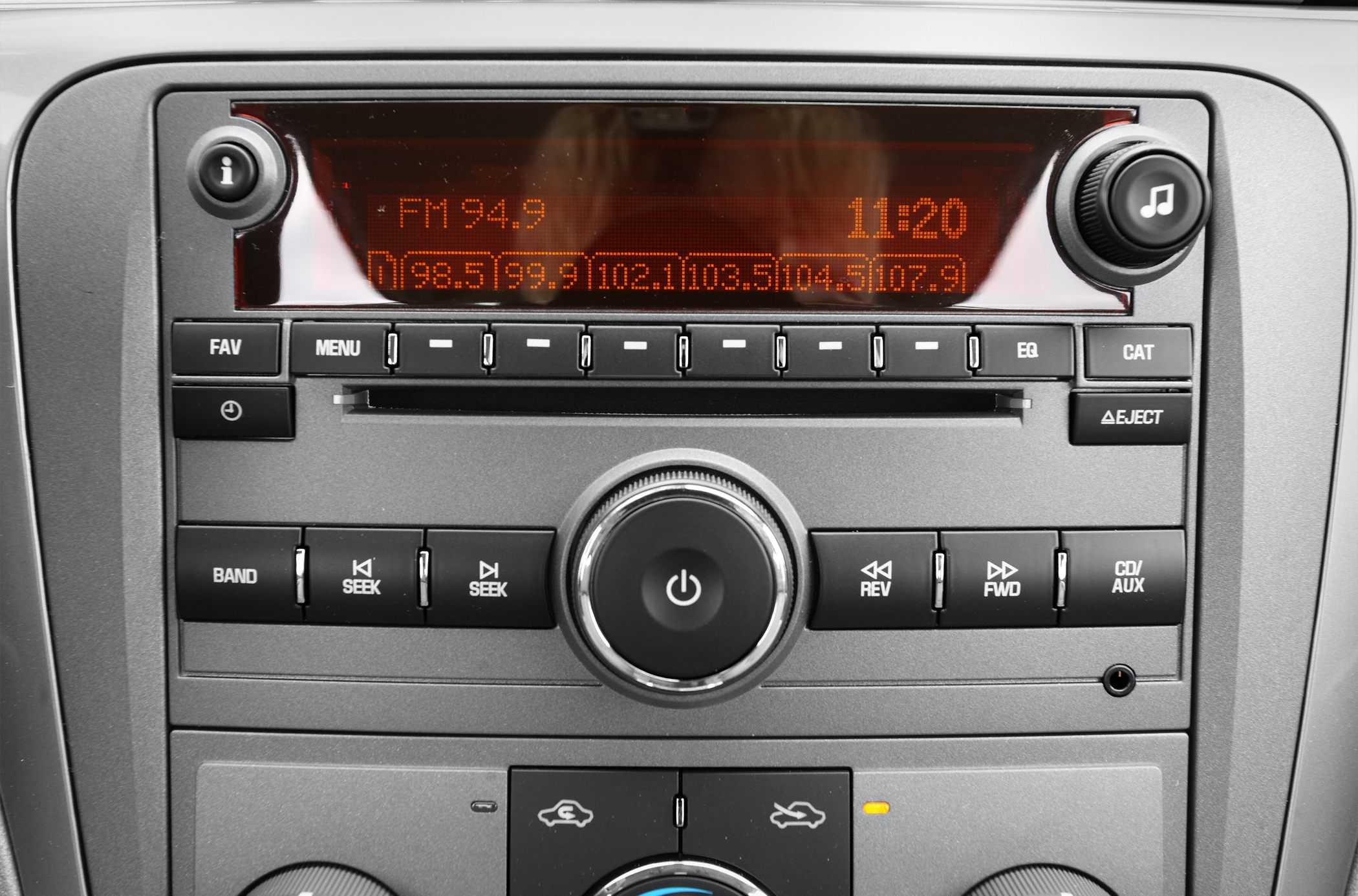 Factory car radio and audio control panel with FM display and buttons