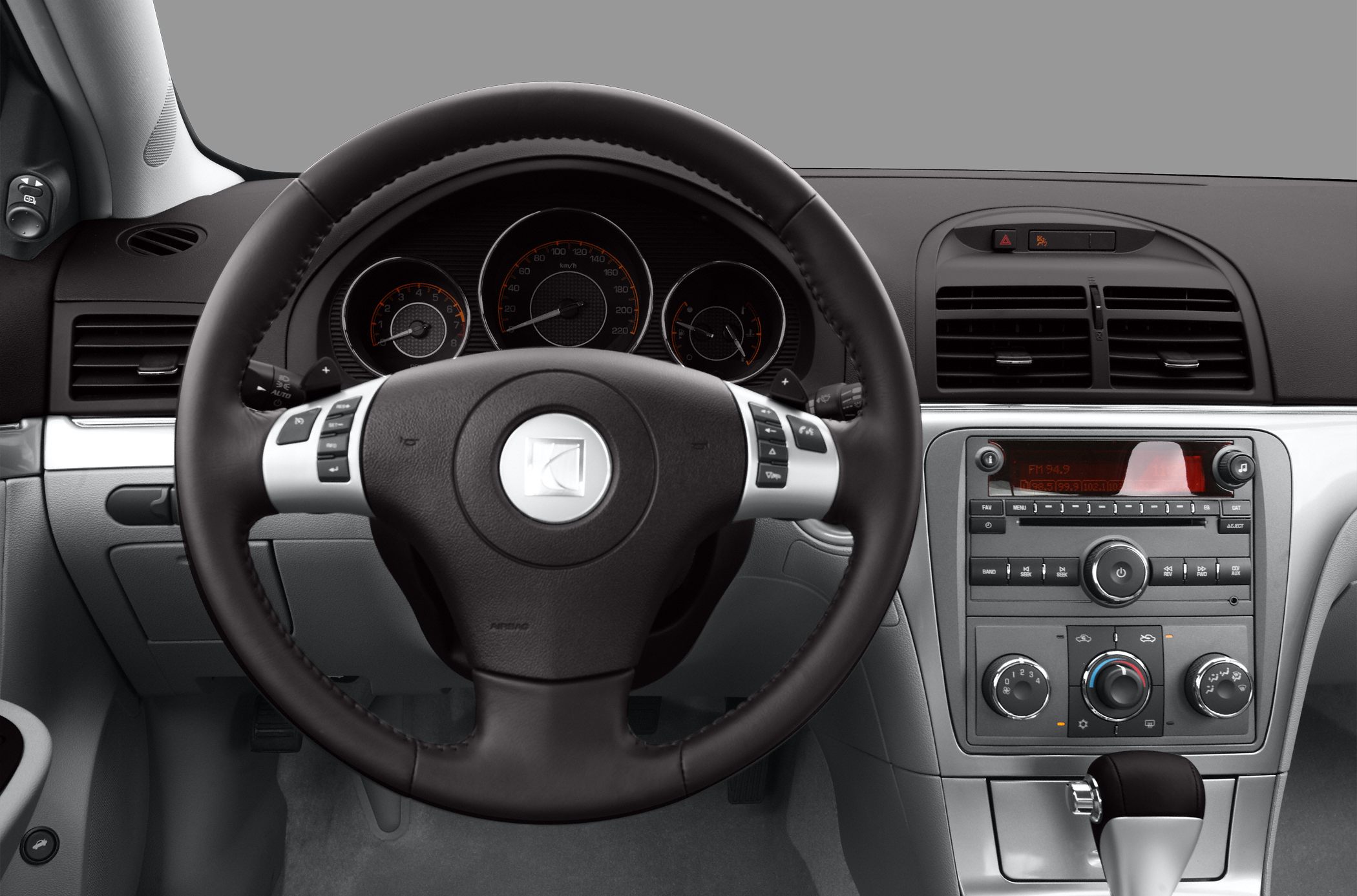 Steering wheel, instrument cluster, dashboard, and center console details