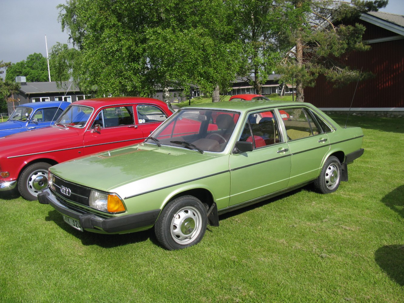 1970s sedan with angular body, rectangular headlights, steel wheels