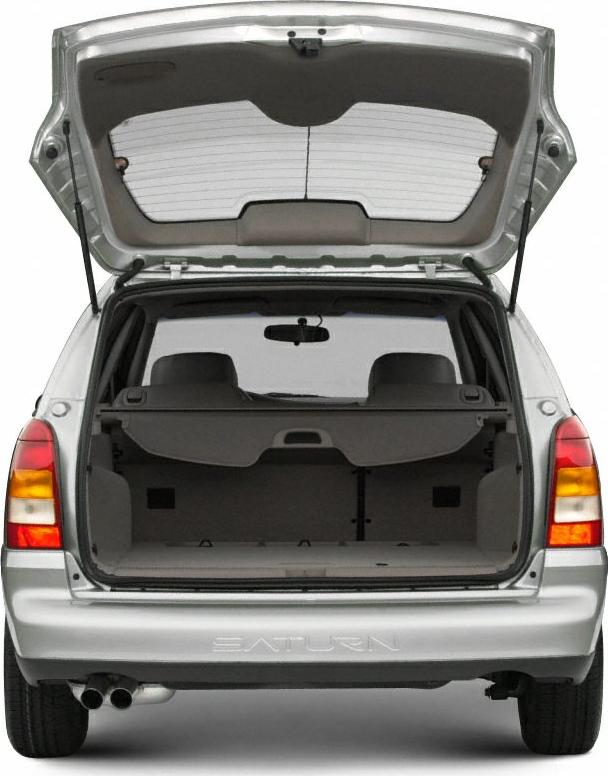 Open rear hatch and spacious cargo area with dual exhaust