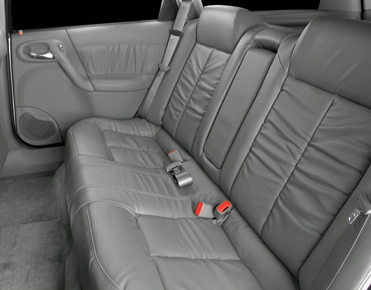 Leather rear seats with detailed stitching and seat belts