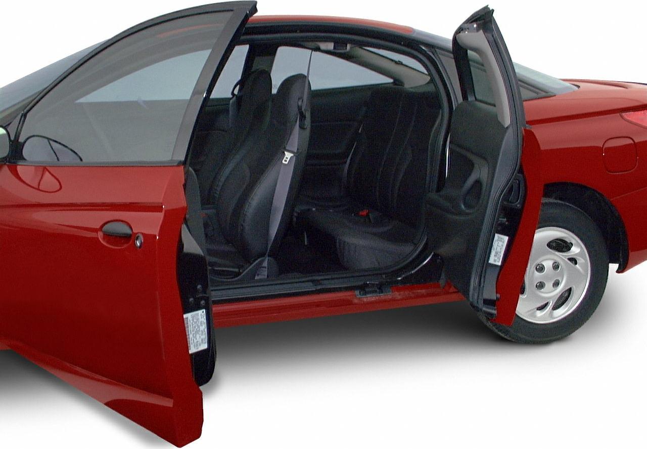 Rear-hinged back doors and interior seating of a compact coupe