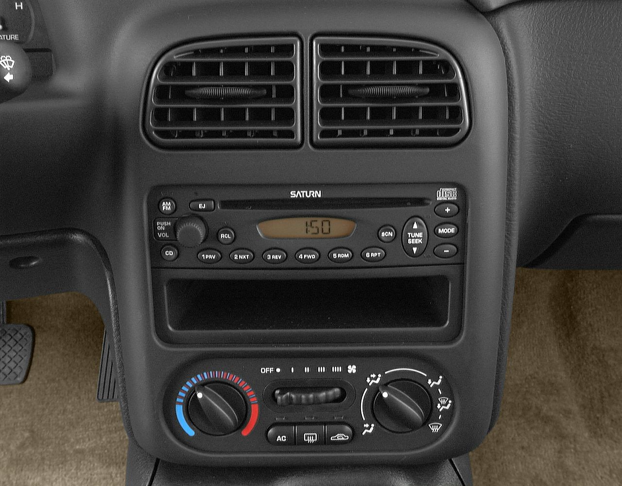 Car radio and climate control console with vents and buttons