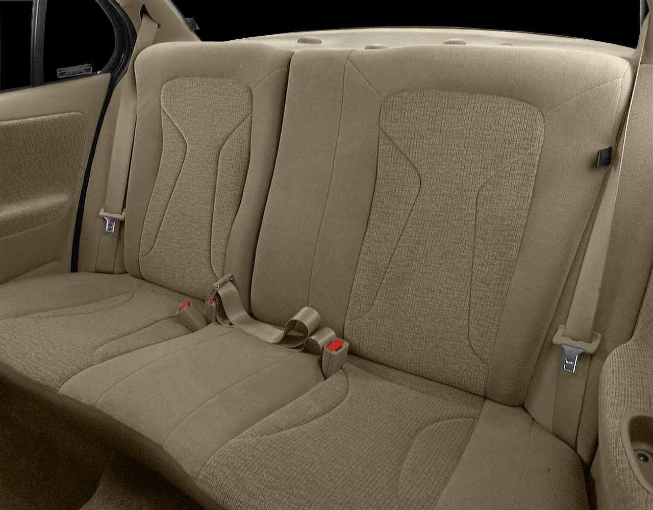 Beige fabric rear seats with seat belts and contoured cushioning