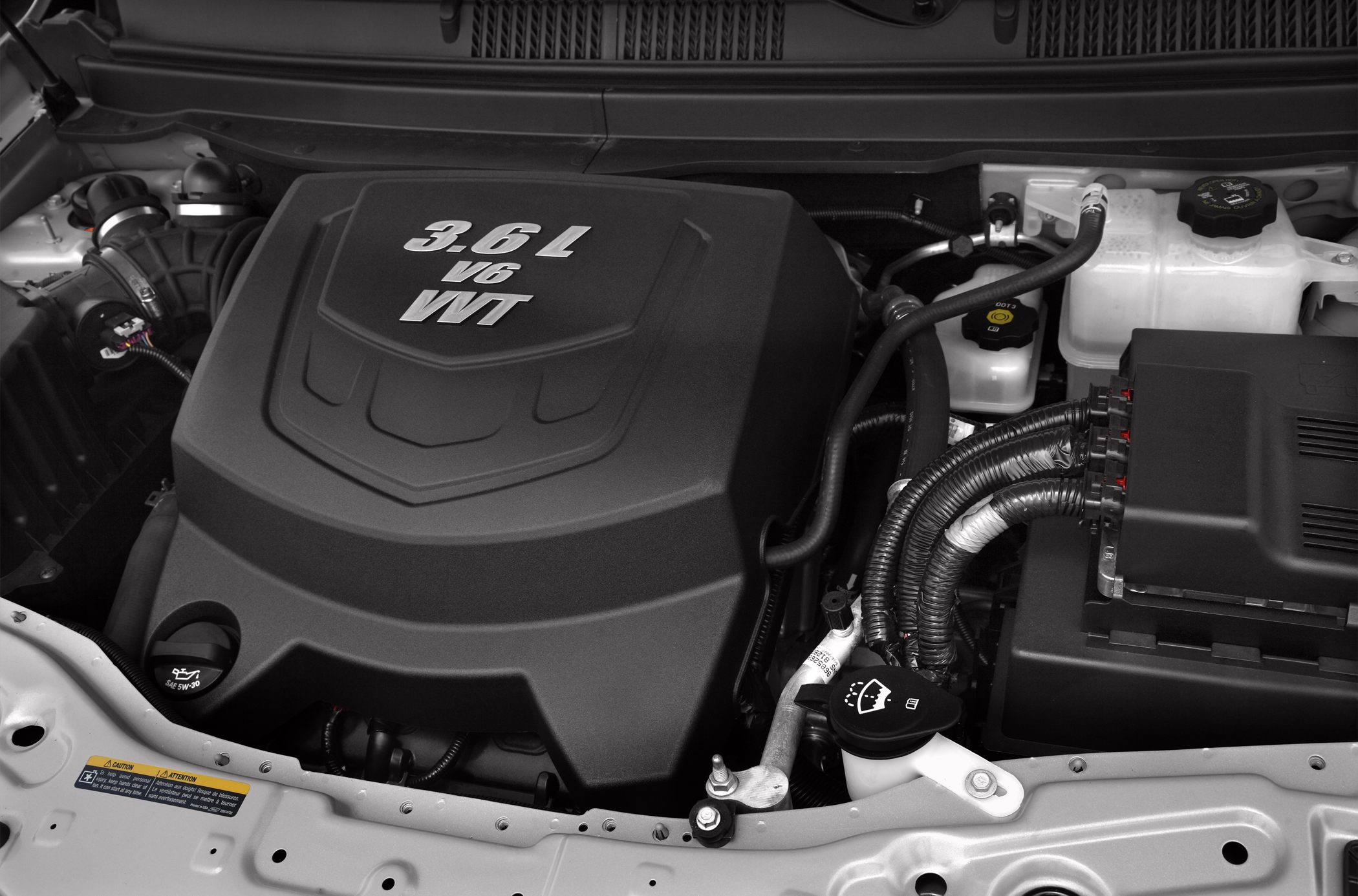 3.6L V6 VVT engine cover and components.